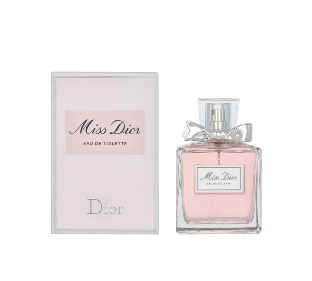 Bottle of DIOR Miss Dior Eau de Toilette, 100ml, featuring a sleek rectangular glass design with a soft pink fragrance, silver cap, and signature bow accent.