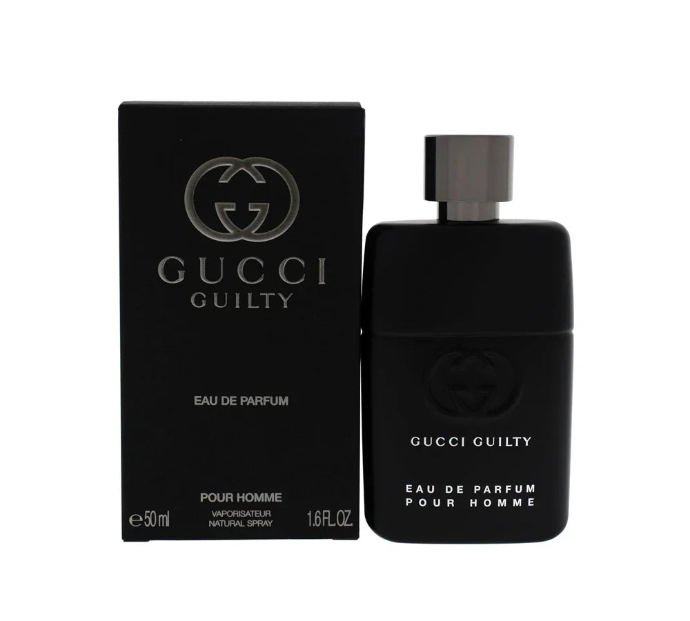 A stylish metallic bottle of Gucci Guilty Pour Homme Eau de Parfum, 50ml, with the signature interlocking G logo and an elegant black cap.