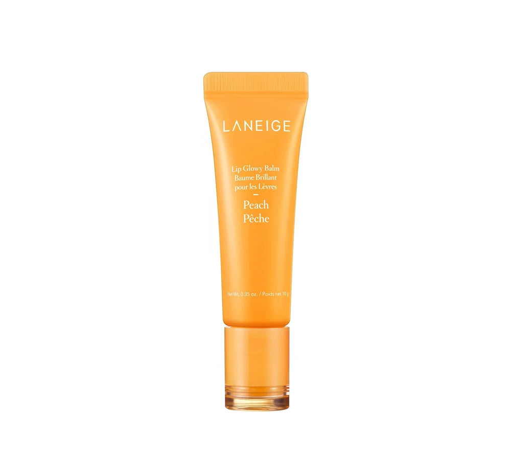 Laneige Lip Glowy Balm Peach 10g – A soft pink squeeze tube with a glossy finish, featuring the Laneige logo, containing a hydrating peach-scented lip balm.