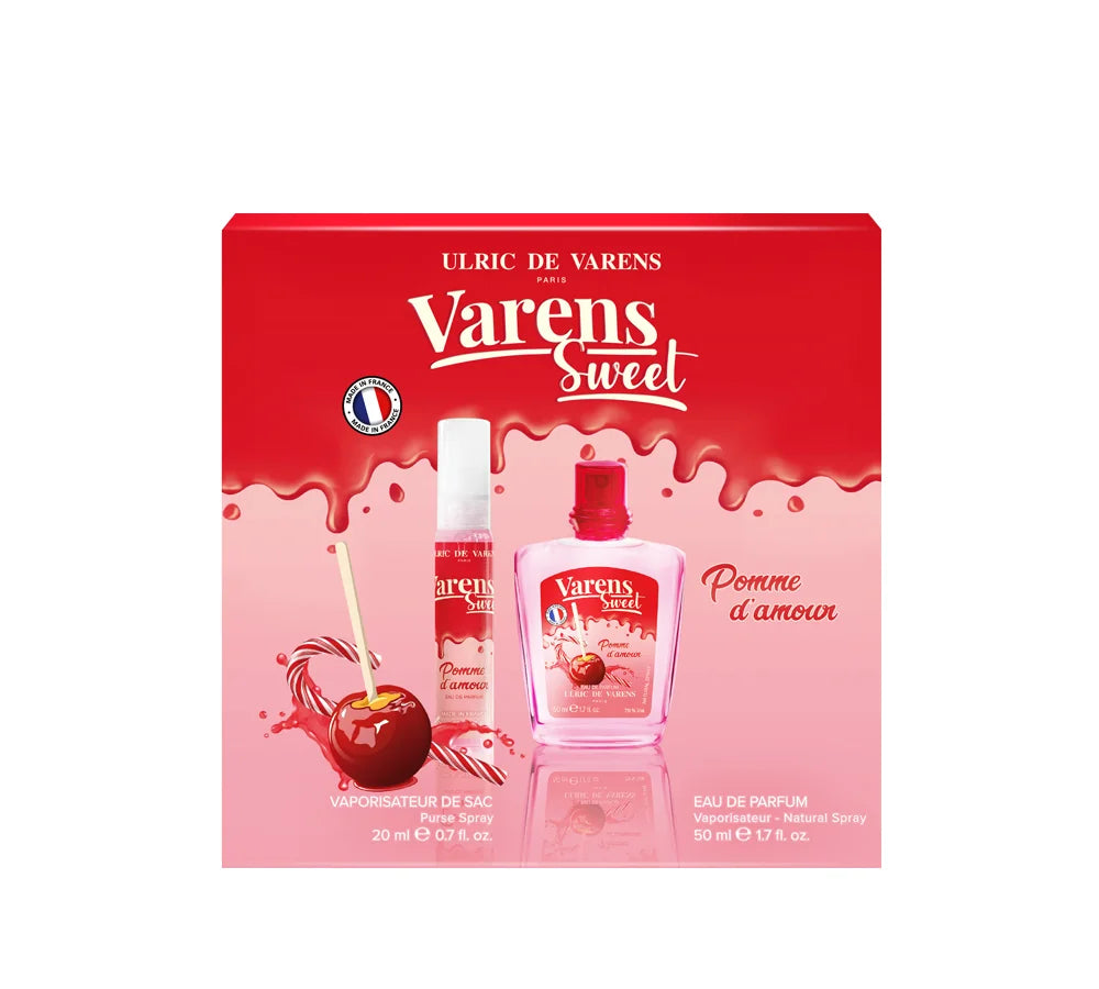 A vibrant gift set featuring UDV Varens Sweet Pomme d'Amour fragrance for women, including a beautifully packaged bottle and matching body care items.